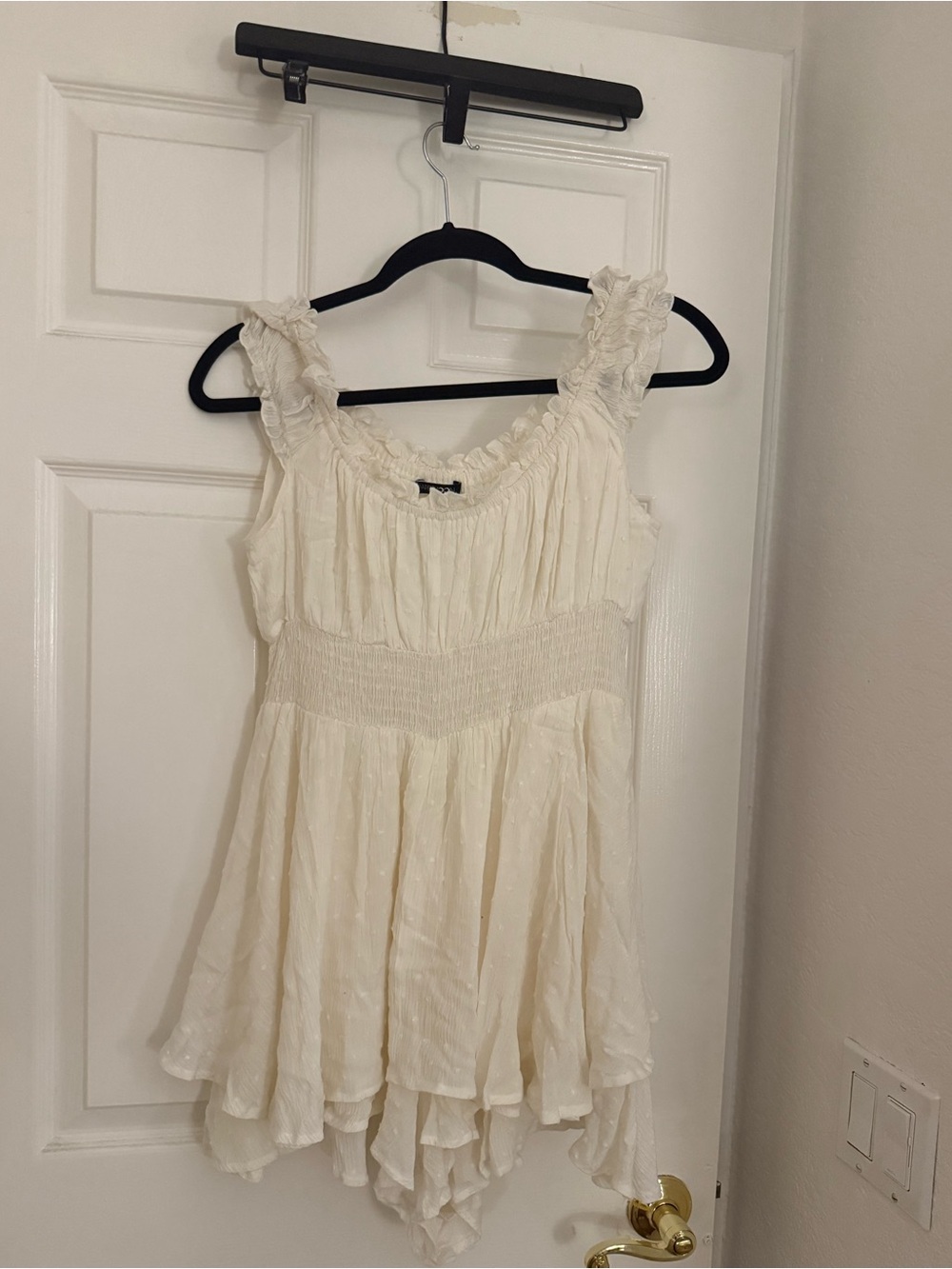 Women's Cream Ruffled Sleeveless Peplum Top
